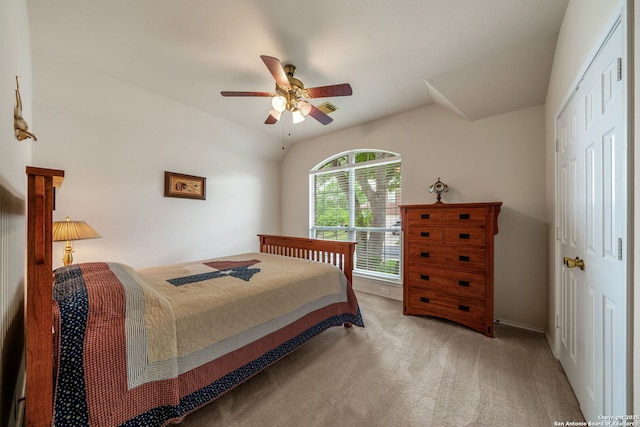 bedroom with carpet floors, baseboards, ceiling fan, and a closet