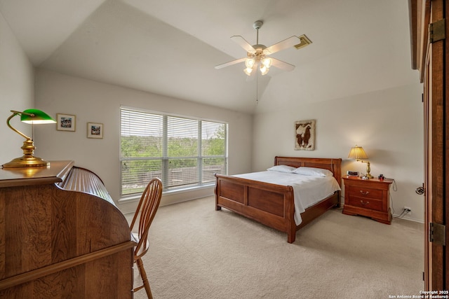 bedroom featuring a ceiling fan, baseboards, light colored carpet, and lofted ceiling