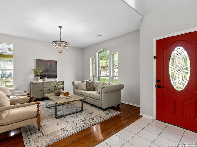 6027 Cedar Path, San Antonio, TX 78249 - foyer entrance featuring visible vents, light wood-style floors, a chandelier, and a healthy amount of sunlight