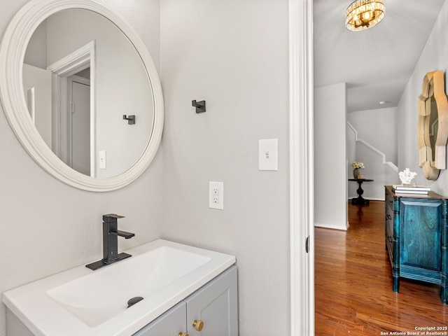 6027 Cedar Path, San Antonio, TX 78249 - bathroom with vanity and wood finished floors