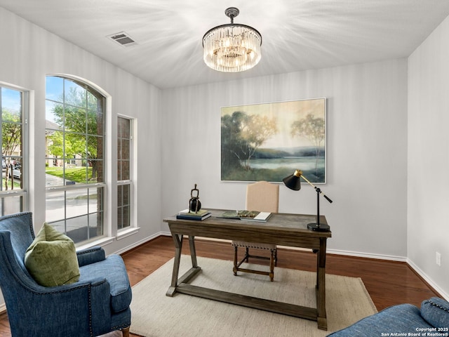 6027 Cedar Path, San Antonio, TX 78249 - office space featuring visible vents, baseboards, wood finished floors, and an inviting chandelier