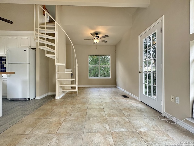 1262 Sleepy Holw, New Braunfels, TX 78130 - interior space with baseboards, a ceiling fan, vaulted ceiling, and stairway