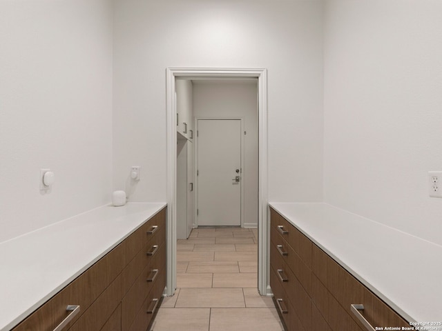 interior space featuring light tile patterned floors