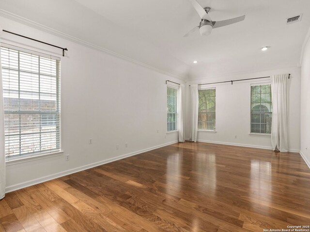 spare room with ceiling fan, plenty of natural light, and ornamental molding