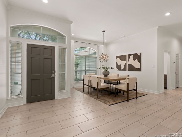 foyer entrance featuring recessed lighting, baseboards, a chandelier, and ornamental molding
