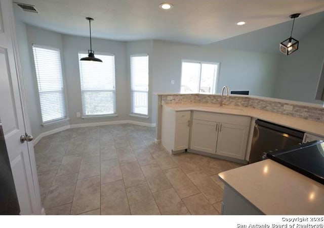 kitchen with visible vents, a sink, dishwasher, and recessed lighting