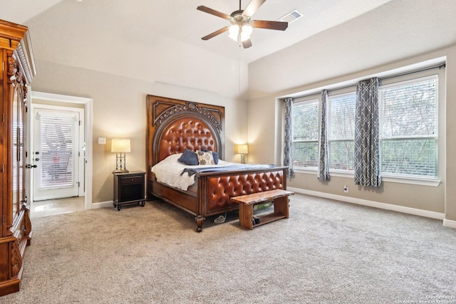 carpeted bedroom featuring a ceiling fan, baseboards, and visible vents