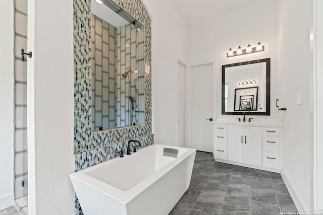 full bath featuring vanity, a soaking tub, and a stall shower