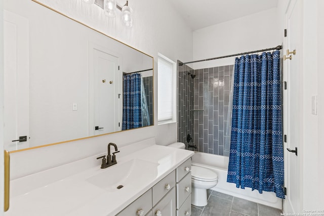 bathroom with vanity, toilet, tile patterned floors, and shower / tub combo
