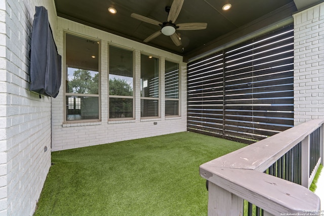 view of yard with a ceiling fan