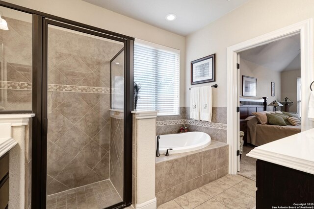3811 Valencia Ct, San Antonio, TX 78259 - full bath with vanity, tile patterned floors, a garden tub, ensuite bath, and a shower stall