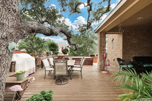 3811 Valencia Ct, San Antonio, TX 78259 - wooden terrace with outdoor dining area and a grill