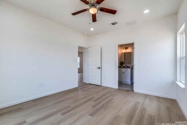 unfurnished bedroom featuring recessed lighting, baseboards, visible vents, and light wood-type flooring