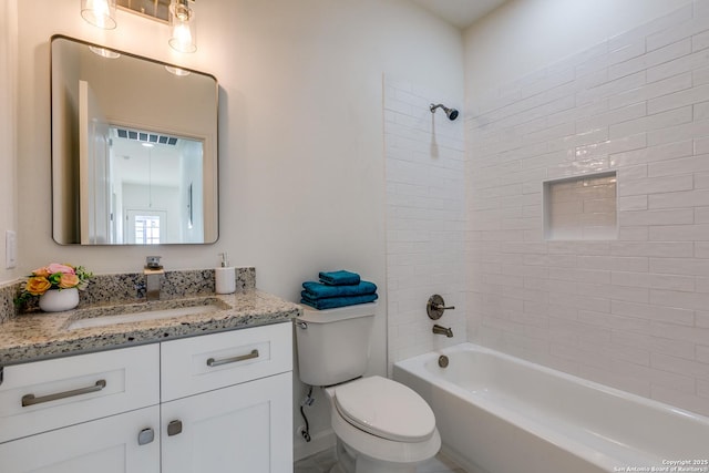 full bath with toilet, washtub / shower combination, and vanity