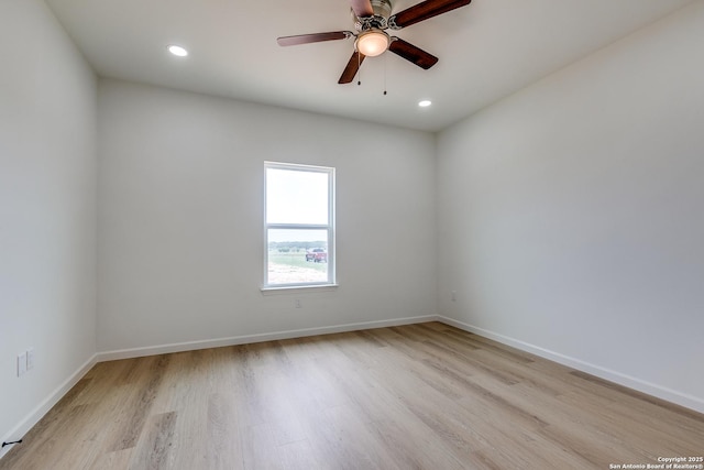 unfurnished room featuring light wood-style floors, baseboards, a ceiling fan, and recessed lighting