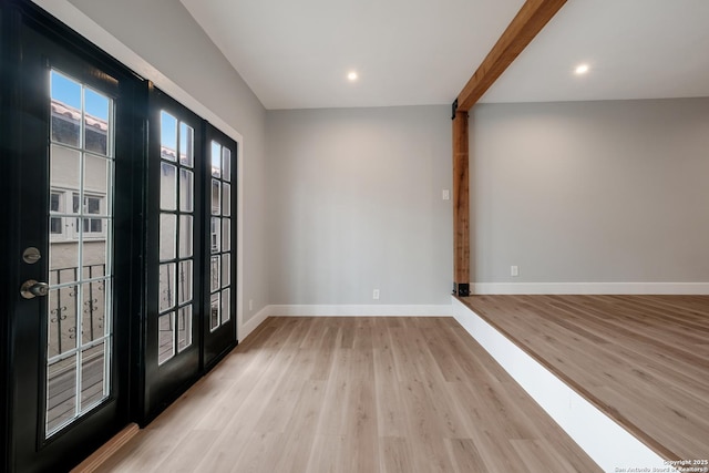66 Brees Blvd Unit 125, San Antonio, TX 78209 - empty room with baseboards, recessed lighting, light wood finished floors, and french doors