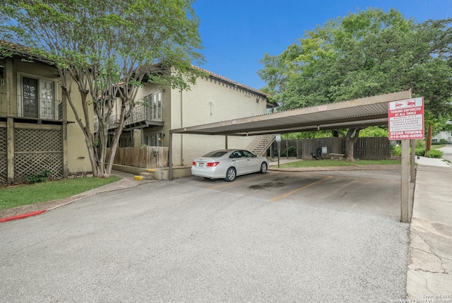 66 Brees Blvd Unit 125, San Antonio, TX 78209 - covered parking lot with fence