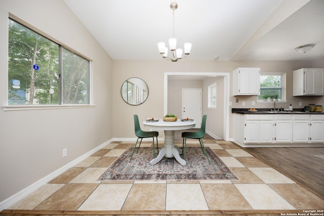 5154 Village Grn, San Antonio, TX 78218 - dining space featuring an inviting chandelier and baseboards