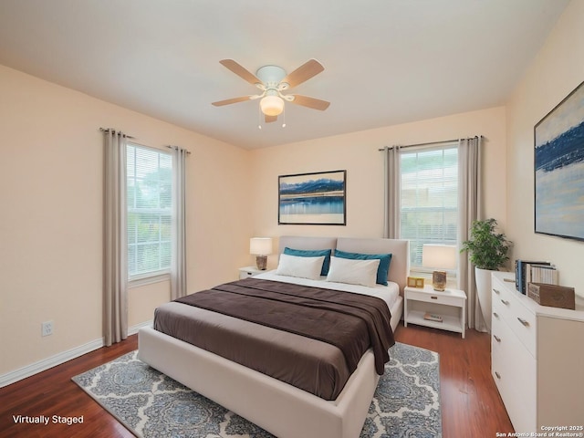1136 Kentucky Ave, San Antonio, TX 78201 - bedroom with baseboards, multiple windows, a ceiling fan, and wood finished floors