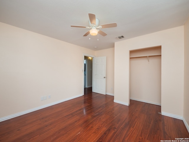 1136 Kentucky Ave, San Antonio, TX 78201 - unfurnished bedroom with baseboards, wood finished floors, and a closet