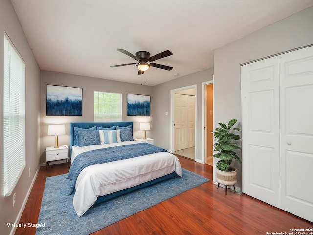 1136 Kentucky Ave, San Antonio, TX 78201 - bedroom with baseboards, ceiling fan, and wood finished floors