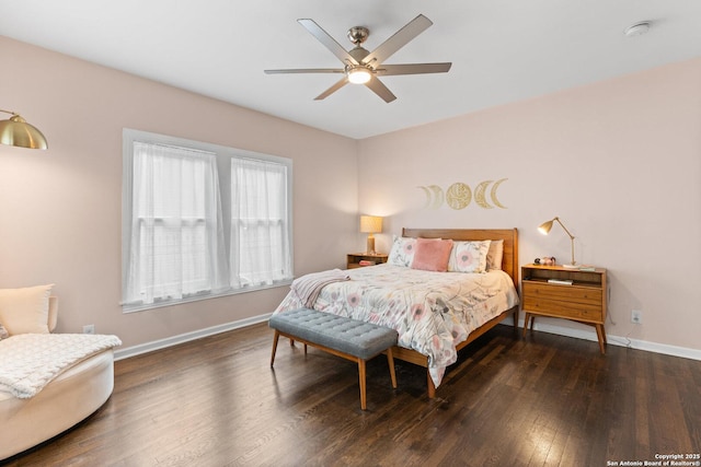 bedroom featuring baseboards, a ceiling fan, and wood finished floors