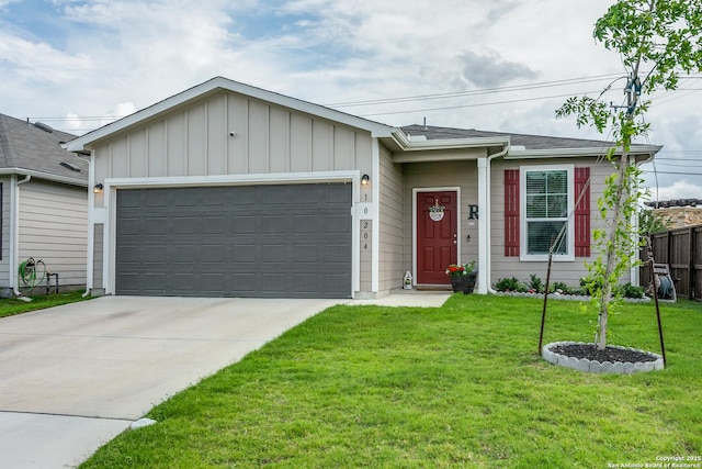 ranch-style house featuring an attached garage, board and batten siding, a front yard, and concrete driveway