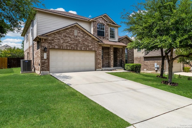 traditional-style home with driveway, central air condition unit, brick siding, fence, and a front lawn