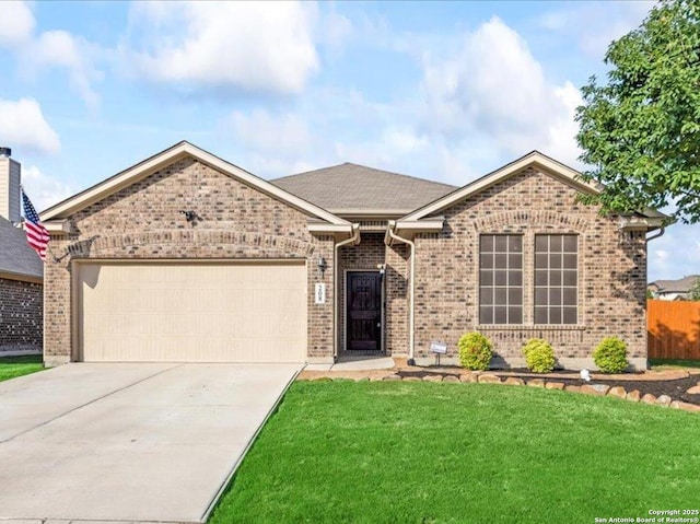 ranch-style house featuring a garage, concrete driveway, a front lawn, and brick siding
