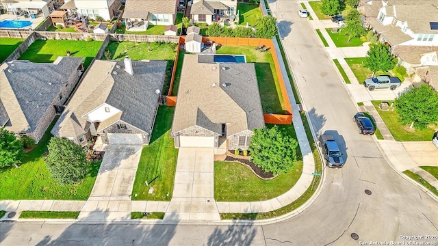 drone / aerial view with a residential view