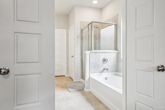 9223 Yaya, Converse, TX 78109 - bathroom featuring recessed lighting, tile patterned floors, a bath, and a stall shower