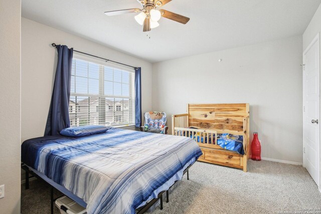 9223 Yaya, Converse, TX 78109 - carpeted bedroom featuring ceiling fan and baseboards