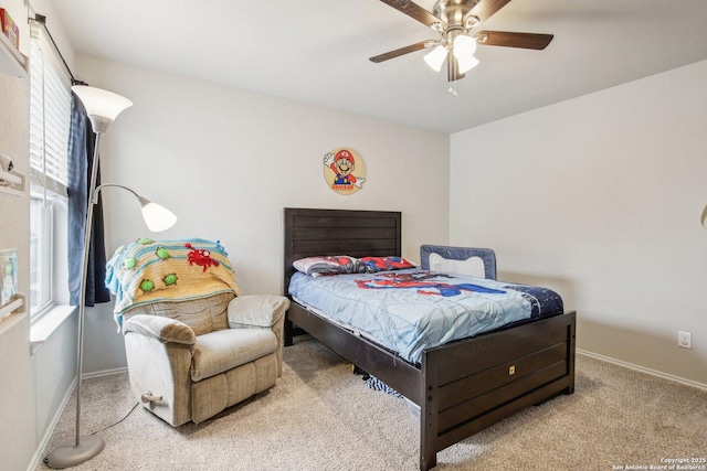 9223 Yaya, Converse, TX 78109 - carpeted bedroom with baseboards and a ceiling fan
