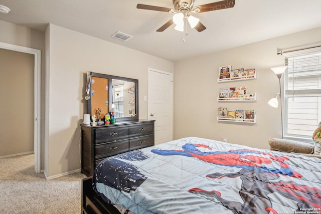 9223 Yaya, Converse, TX 78109 - bedroom with visible vents, baseboards, ceiling fan, and light carpet