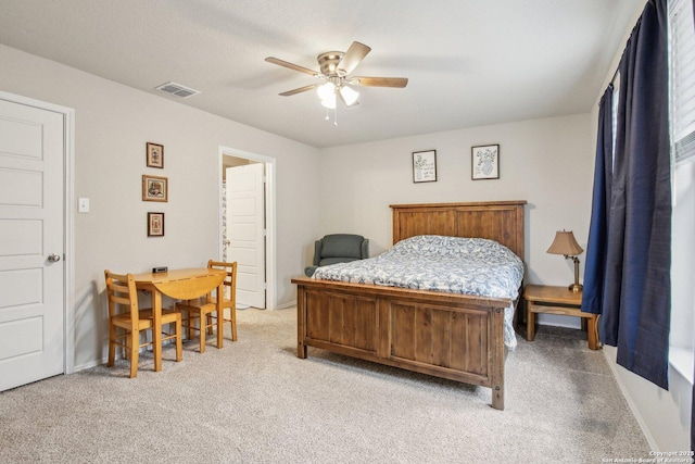 9223 Yaya, Converse, TX 78109 - bedroom with visible vents, baseboards, ceiling fan, and light carpet