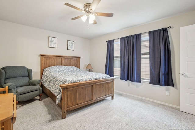 9223 Yaya, Converse, TX 78109 - bedroom with baseboards, ceiling fan, and light carpet