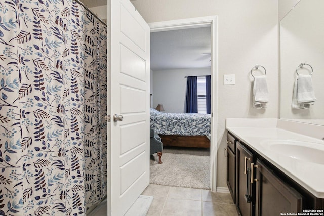 9223 Yaya, Converse, TX 78109 - bathroom with vanity, tile patterned floors, ensuite bath, and curtained shower