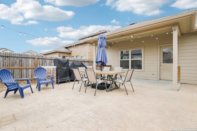 9223 Yaya, Converse, TX 78109 - view of patio featuring fence and outdoor dining space