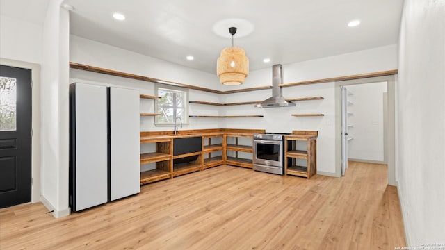 kitchen with wall chimney range hood, electric range, open shelves, and light wood-style floors