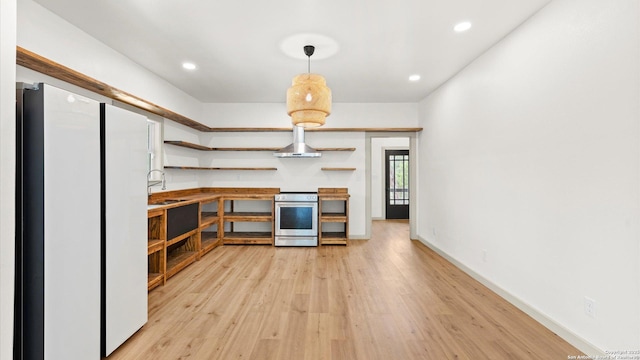 kitchen featuring open shelves, freestanding refrigerator, recessed lighting, stainless steel electric range, and light wood finished floors