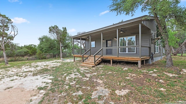 view of front of house featuring a ceiling fan