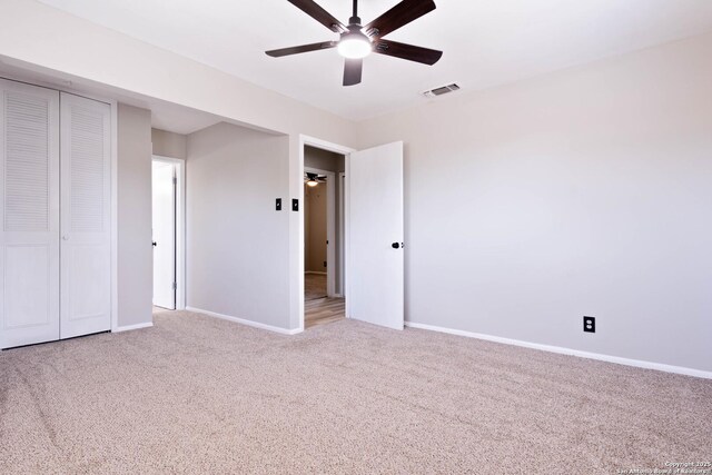 2902 Big Horn, San Antonio, TX 78228 - unfurnished bedroom with light carpet, baseboards, a closet, and ceiling fan