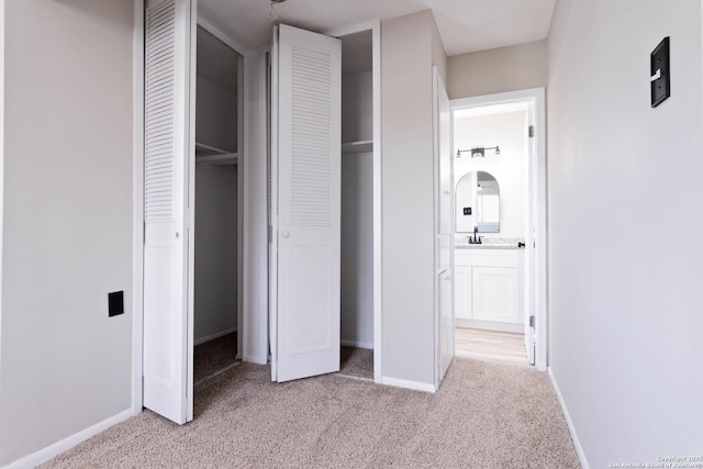 2902 Big Horn, San Antonio, TX 78228 - unfurnished bedroom with light carpet, baseboards, and connected bathroom