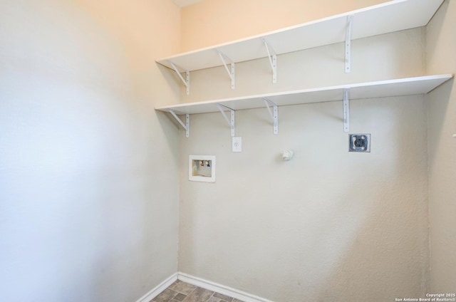 laundry room featuring baseboards, laundry area, electric dryer hookup, and hookup for a washing machine