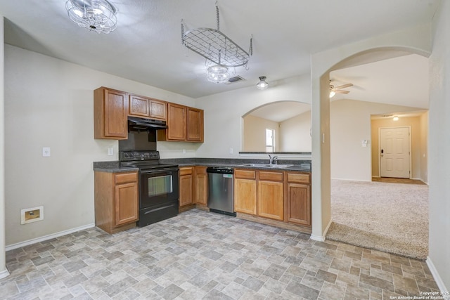 kitchen with a sink, dishwasher, black electric range, stone finish floor, and under cabinet range hood