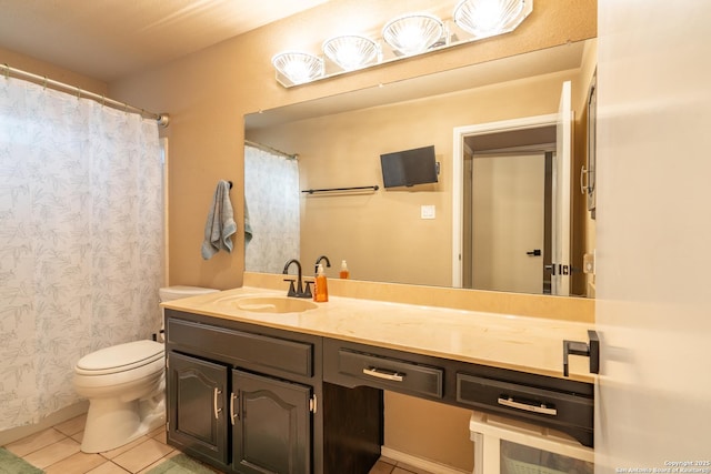 full bath with vanity, tile patterned flooring, and toilet
