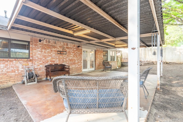 view of patio / terrace featuring fence