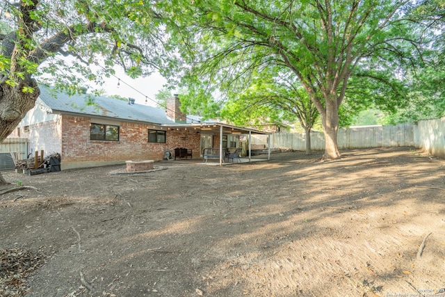view of yard with a patio and a fenced backyard