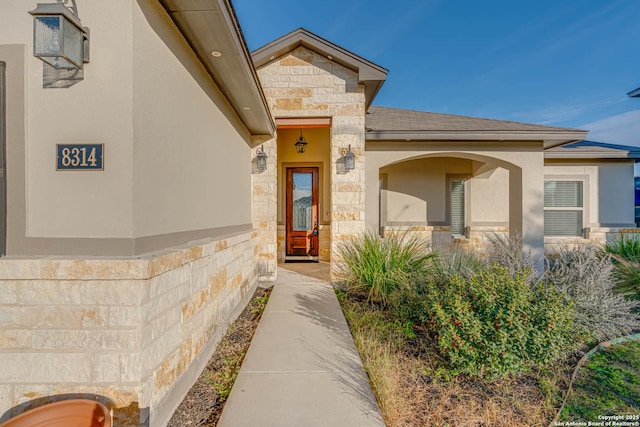 8314 Marek, San Antonio, TX 78224 - view of exterior entry with stucco siding and stone siding