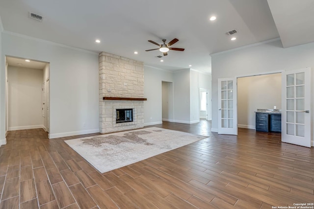 8314 Marek, San Antonio, TX 78224 - unfurnished living room with baseboards, ceiling fan, ornamental molding, and french doors